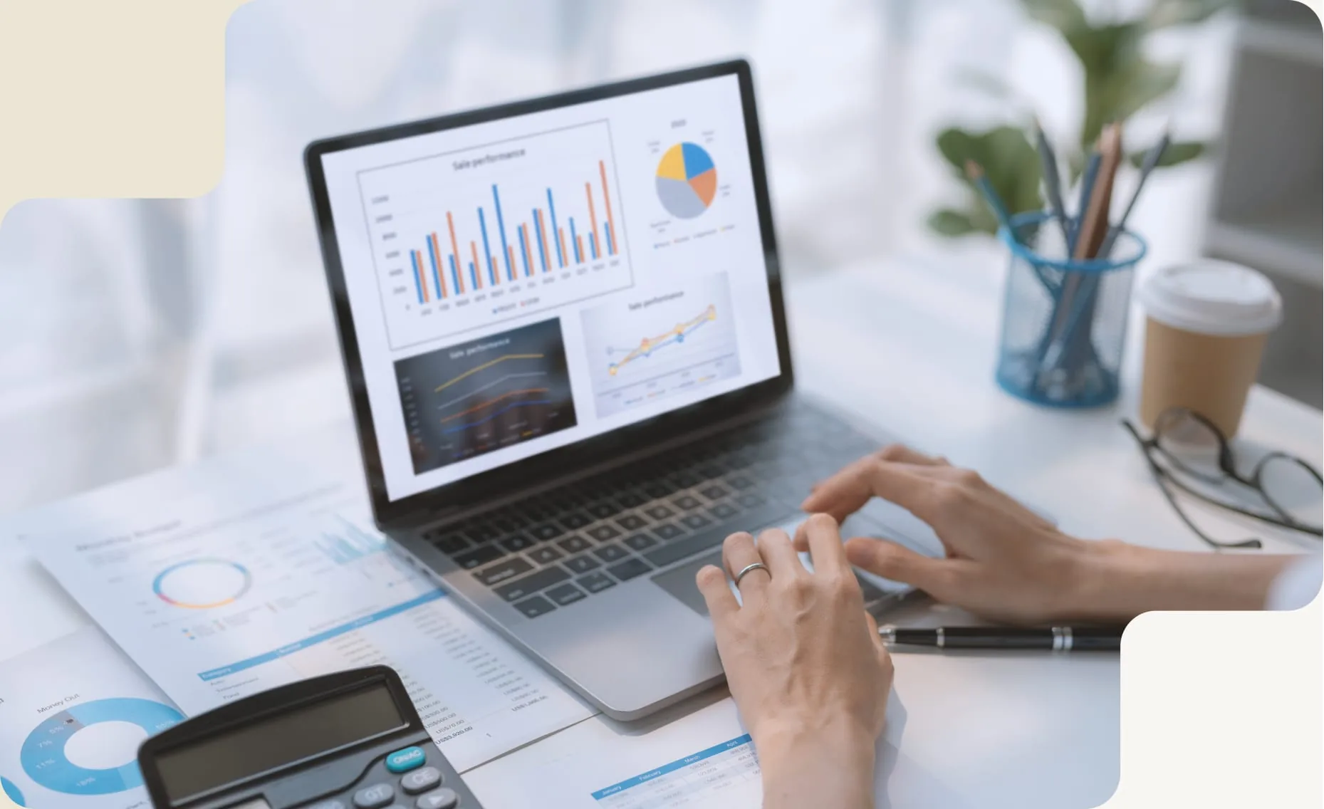 Financial reports and tax data displayed on a laptop